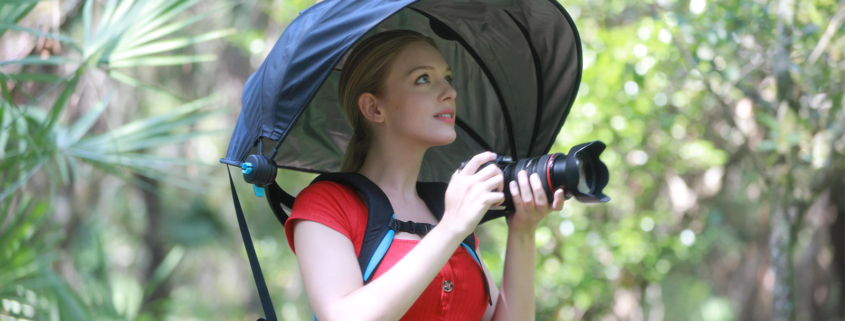 Canope Umbrella از عکاسان محافظت می کند ، دستان را آزاد نگه می دارد